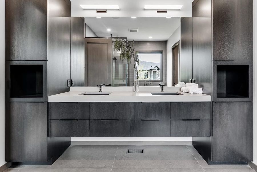 Modern primary bath with floating double vanity and curbless shower