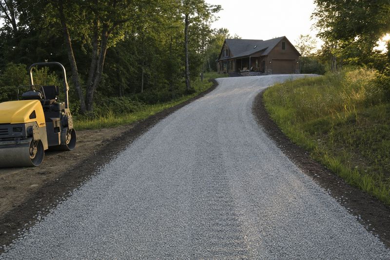 Compacted gravel driveway with a finished crown