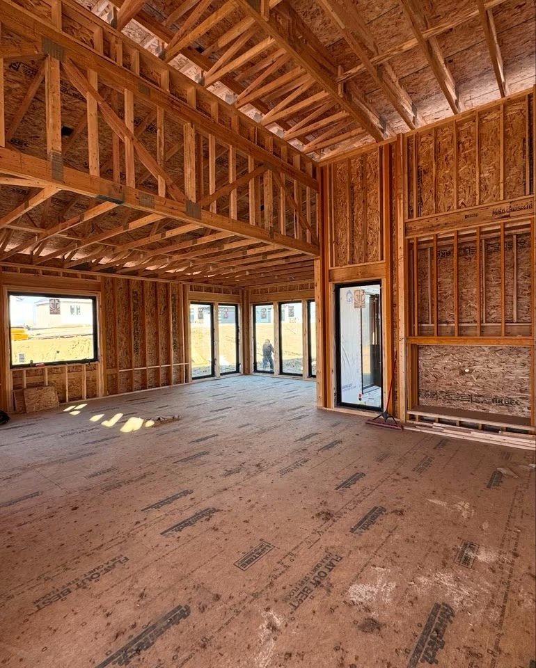 Open plan framing with window and door openings roughed in