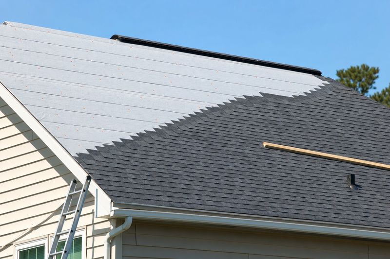 Architectural shingle roof replacement in progress